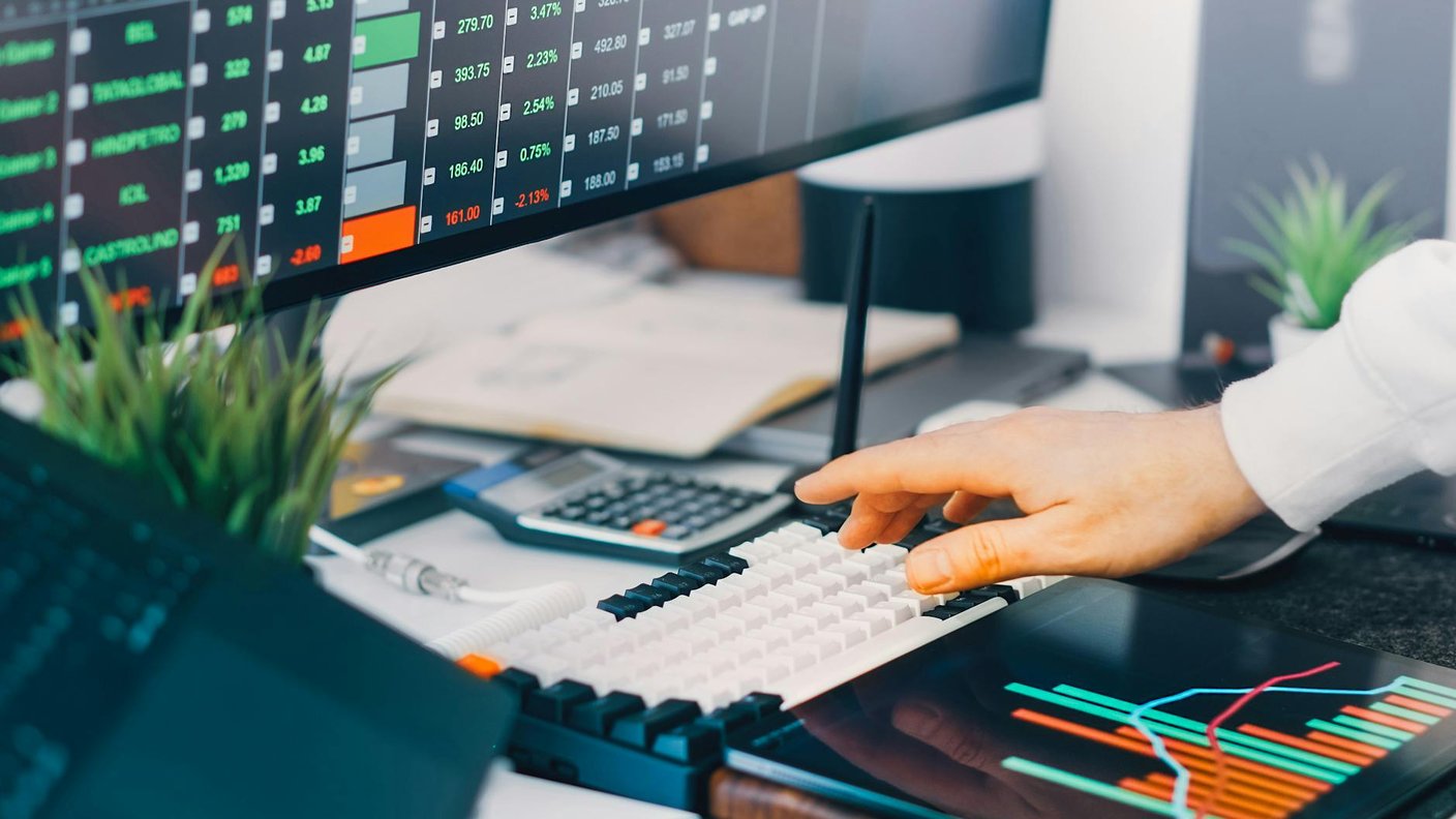 An operator reviewing account health metrics at a desk